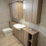 modern wooden bathroom cupboards with sink and toilet